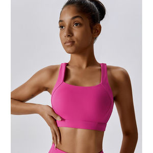 Sujetador deportivo ligero y sencillo de color magenta con diseño de espalda cruzada, transpirable y elástico, de alta calidad para gimnasio de mujer, venta al por mayor y personalizado. - Product Image 1