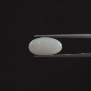 โอปอลสีขาวธรรมชาติแบบขายส่ง น้ำหนัก 2.59 กะรัต รูปทรงวงรี ขนาด 14.5x8 มม. ได้รับการรับรองจาก IGI ขัดเงาด้วยมือ ใช้น้ำมัน/แว็กซ์ คุณภาพดี - Product Image 1