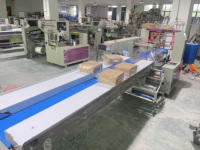 Machine d'emballage automatique de haute qualité pour pain pita arabe de 9 pouces, machine d'emballage pour tortillas de farine, tortillas de maïs, burritos