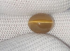 คริโซเบอรีลธรรมชาติ 6.95 กะรัต รูปทรงแคทอาย โอวัล คาโบชอง |   อัญมณีสะสมแบบแยกชิ้น |   ผู้จัดจำหน่ายสินค้าขายส่งอินเดีย |   เกรดเครื่องประดับ - Product Image 2