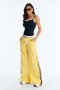 กางเกงขายาวทรงหลวมแบบ unisex ผ้าไนลอน มีกระดุมด้านข้าง รูดเชือกผูกเอว สไตล์ลำลอง สตรีทแวร์ สำหรับผู้ชายและผู้หญิง - Product Image 6