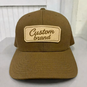 Gorras Trucker de Malla de 6 Paneles Unisex de Tela CVC en Color Personalizado con Logotipo de Cuero Grabado, para Uso Deportivo, Casual y al Aire Libre - Product Image 1