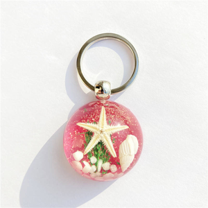 Porte-clés Monde Sous-Marin en Résine Étoile de Mer Ambre – Bijou Fantaisie Mignon et Tendance, Idéal Cadeau - Product Image 2