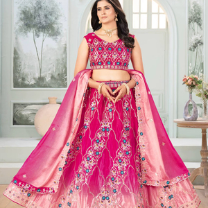 Ramdev Trading ATTRACTION WOMAN BRIDAL LEHENGACHOLI PINK COLOR FULL FLAIR EMBOSSED WORK TRADITIONAL PARTY/WEDDING ALL SEASONS - Product Image 1