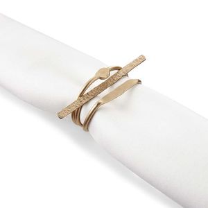 Meilleures ventes : Anneaux de serviette sculpturaux en barres d'or, faits à la main, en métal, pour décoration de table contemporaine, dîner, mariage, fête, événement, restaurant, cadeaux - Product Image 1