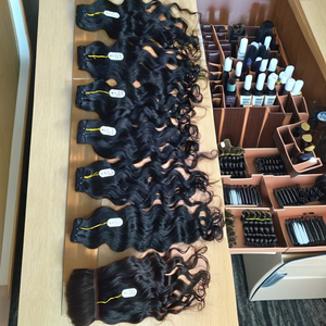 Paquets de cheveux bruts indiens non transformés à cuticules alignés cheveux humains naturels Super Double extrémités dessinées cheveux bouclés de l'Inde vendeur - Product Image 1