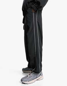 Ensemble de survêtement unisexe coupe-vent réfléchissant avec passepoil, veste et pantalon légers en polyester à fermeture éclair, vente en gros OEM - Product Image 3