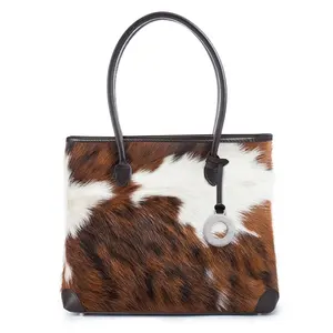 Venta al por mayor de fábrica directa Venta caliente de pelo de vaca en el bolso de mano 2024 Nueva moda de las mujeres bolsos de mano - Product Image 1