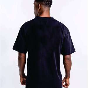 Camiseta de algodón 100% de color sólido al por mayor para hombre, cuello redondo, básica, informal, para uso diario, corte holgado. - Product Image 3