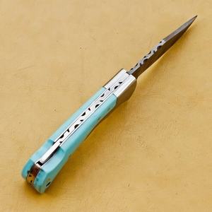 มีดพับเหล็กดามัสกัส ด้ามเทอร์ควอยซ์ พร้อมที่จุดไฟ สำหรับพกพา ล่าสัตว์ คุณภาพสูง 58HRC รับประกัน 3 ปี ODM OEM - Product Image 2