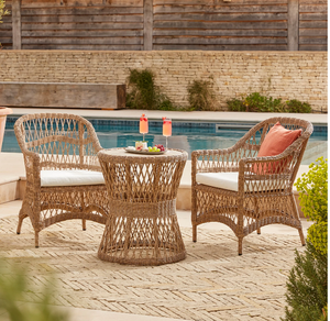 Four-piece woven wicker rattan outdoor sofa set with metal legs, seat <b>pads</b> and glass top table, available at wholesale prices. - Product Image 5