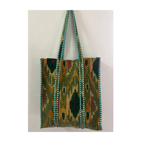 Bolsa de Mano Ecológica de Algodón con Tela Acolchada, Diseño Vibrante y Asas Cosidas Resistentes - Product Image 1