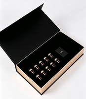 Boîte cadeau rigide magnétique noire de luxe avec logo personnalisé, insert en velours pour l'emballage de cosmétiques en ampoules