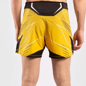 Shorts de combat MMA géométriques jaunes pour hommes, séchage rapide, taille mi-haute élastique, 100 % polyester tissé, logo personnalisé sur le devant avec poches - Product Image 4