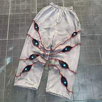 Pantalon Harem Homme Déchiré avec Imprimé Œil Lumineux, Taille Élastique, Style Urbain, Joggers à Cordon, Tricoté en Polyester pour l'Automne