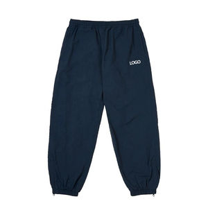 Pantalones deportivos unisex OEM 2026, estilo jogger, ligeros, de nailon, para senderismo, con cremallera en las piernas y forro de malla. - Product Image 1