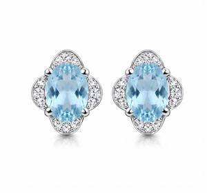 Rhaya Jewels Sterling <b>Silver</b> Rhodium Plated Romantic Floral Blue Topaz Prong Set <b>Stud</b> <b>Earrings</b> CZ Halo Wedding Engagement Party - Product Image 1