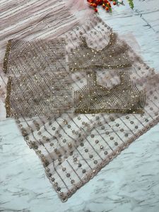 Sari de créateur moderne extensible brodé de sequins et de motifs papillon, avec travail riche et chemisier non cousu, idéal pour les mariages et les soirées de luxe - Product Image 1