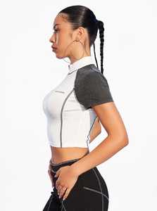 ONETEN APPAREL Top Corto de Yoga para Mujer, Transpirable, Ajustado, Blanco, con Cuello Simulado de Media Cremallera, Logotipo Frontal y Bloques de Color - Product Image 2