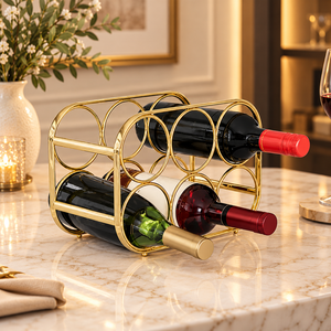 Support de rangement pour bouteilles de vin en métal doré de précision, design en boucle circulaire, pour 4 bouteilles, à poser sur comptoir - Product Image 1
