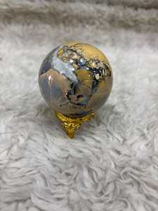 Esfera de jaspe Maligano con patrones tierraños vibrantes, superficie pulida, simetría redondeada y variación de color distintiva para minera. - Product Image 3