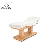 Lit médical électrique au design moderne avec éclairage et chauffage, table de massage en bois pour spa facial et salon de beauté, idéal pour salon ou hôtel