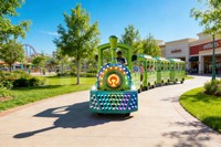 Train sans rails en acier Nova Rides, équipement de parc d'attractions TLT-FT1 pour 24 personnes, train électrique de tourisme, train de dessin animé