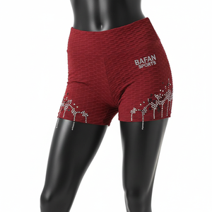 Shorts de tela texturizada roja de poliéster y spandex de 240 GSM premium, suaves y elásticos, con detalle de logotipo con pedrería. - Product Image 6