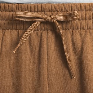 Pantalon de jogging léger et respirant pour homme en polyester et élasthanne noir, à taille élastique, avec braguette zippée et poches latérales, idéal pour le printemps - Product Image 3