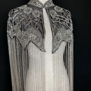 เสื้อครอปถักโครเชต์แฮนด์เมด ไร้แขน ประดับมุก พู่ห้อย เซ็กซี่ โชว์หลังเว้า ดีไซน์โปร่ง สำหรับฤดูร้อน วันหยุดพักผ่อน ชายหาด - Product Image 1