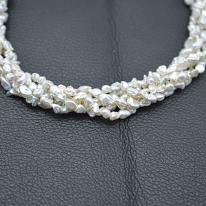 ไข่มุกน้ำจืดธรรมชาติสีขาวบริสุทธิ์ AAA ขนาด 8 มม. 10 มม. รูปทรงไม่สม่ำเสมอ แบบใหม่ สำหรับทำเครื่องประดับ มีจำหน่ายในราคาส่ง - Product Image 3