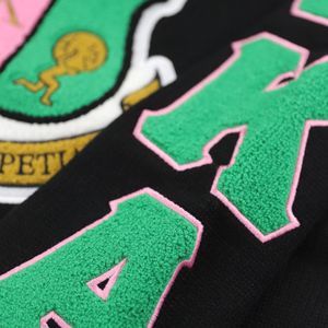 เสื้อสเวตเตอร์ถักคอวีสีขาวดำสำหรับผู้หญิง ปักลายตราสัญลักษณ์ แขนยาว สวมใส่สบาย แฟชั่นเสื้อคลุมลำลอง สไตล์เก๋ไก๋สำหรับทุกวัน - Product Image 4