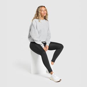 Sweat à col rond décontracté pour femmes 100% coton couleur unie à manches longues en tricot extensible coupe ample pull avant Logo pour l'hiver - Product Image 1