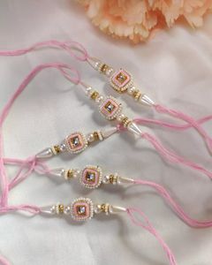 Bracelet artisanal traditionnel classique en perles d'imitation en forme de clochette pour frères, idéal pour les cadeaux de Raksha Bandhan - Product Image 1