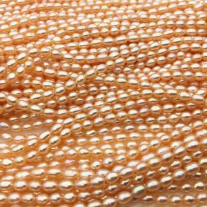 Perles de riz d'eau douce ovales teinte orange 3-5mm en vrac, brin de 15 pouces pour la fabrication de bijoux, vente en gros, haute brillance - Product Image 1
