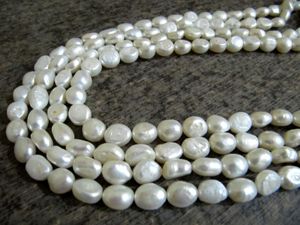 Perles d'eau douce naturelles blanches, forme roulée, 8x10mm - Product Image 1