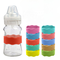 Manchon de biberon en silicone de qualité alimentaire antidérapant et protecteur pour bébés de 0 à 12 mois et de 1 à 2 ans OEM