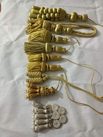 Cordón de borlas largas doradas personalizable OEM al por mayor, borla clerical con hilo metálico para ropa y bolsos - Hecho por Hamza