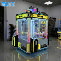Machine à griffes d'arcade 4 joueurs, à monnayeur, avec distributeur de prix multi-emplacements, joystick, lumières LED et roues