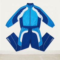 Conjunto Deportivo Unisex Azul con Bloques de Color, Chaqueta con Cierre y Cuello Alto, Estilo Deportivo, Transpirable, de Poliéster, para Adultos, Otoño