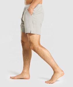 Gran oferta de pantalones cortos deportivos para hombre, pantalones cortos de entrenamiento de gimnasio de secado rápido con bolsillo, patrón sólido teñido liso, estilo informal ecológico - Product Image 3