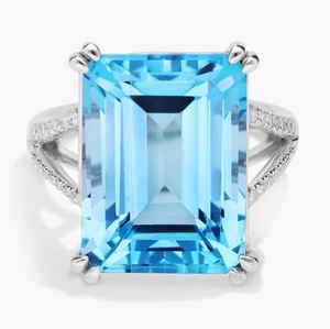 Anillo de compromiso de cóctel con topacio azul cielo, corte esmeralda, chapado en oro blanco de 14K sobre plata de ley, engaste de garra, anillo llamativo para fiesta - Product Image 1