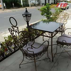 Modern Wrought Iron <b>Table</b> <b>Set</b> Decorative Outdoor Furniture with Iron Chairs for Patios and Garden Spaces - Product Image 1