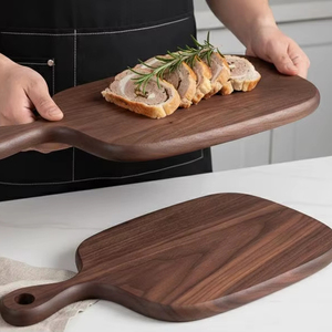 เขียงไม้วอลนัทแท้ งานแฮนด์เมด พร้อมหูจับ ผิวเรียบเนียน สำหรับหั่นหรือเสิร์ฟ - Product Image 1