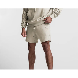 กางเกงขาสั้นลำลองผู้ชายผ้าฝ้ายผสมขนแกะแบบถัก ระบายอากาศ กันน้ำ ทรงจ็อกเกอร์ มีกระเป๋าข้าง ใส่สบาย เหมาะสำหรับวิ่งและใส่ลำลองในฤดูร้อน พร้อมโลโก้แบบกำหนดเอง - Product Image 1