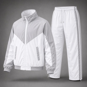 Ensemble de survêtement pour homme avec blocs de couleur, veste à col montant zippée et pantalon, tenue sportive - Product Image 1