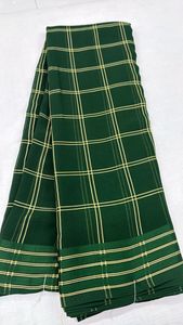 A lightweight, semi-sheer fabric with a slightly crinkled texture A pattern <b>formed</b> by intersecting horizontal and vertical lines - Product Image 5