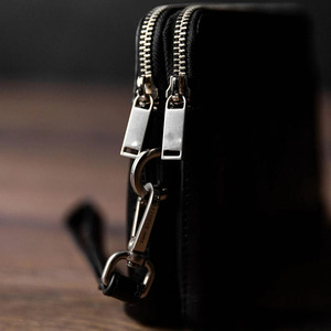 Bolso de mano de cuero de lujo con cremallera resistente, acabado elegante y almacenamiento organizado para reuniones de negocios y eventos nocturnos - Product Image 5