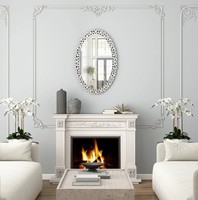 Miroir mural ovale moderne en verre orné de cristaux, cadre luxueux et glamour avec bords fins pour salon, chambre et décoration intérieure