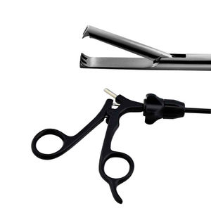 Pince à double action laparoscopique manuelle 2x3 dents en acier inoxydable pour chirurgie abdominale mini-invasive - Product Image 1